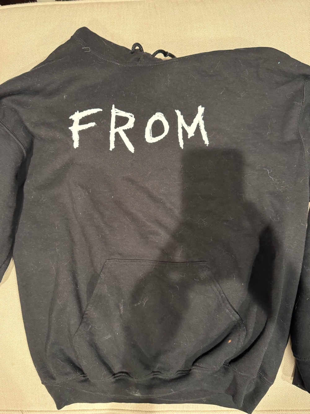 Black Hoodie with 'FROM' MGM+ merch White Graphic
